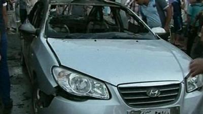 Damaged car in Balad