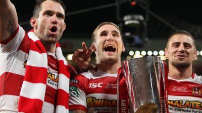 Wigan's Sam Tomkins, Pat Richards and Michael McIlorum celebrate