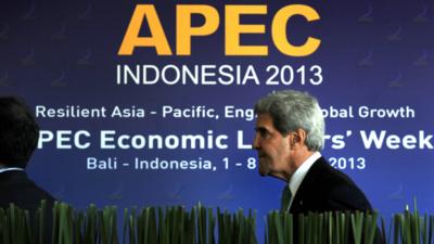 US Secretary of State John Kerry in front of Apec summit sign