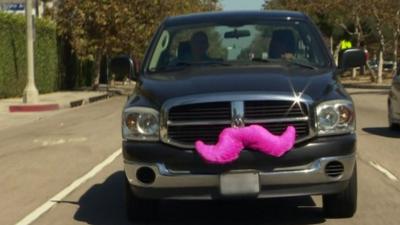 Car with a pink moustache on the front