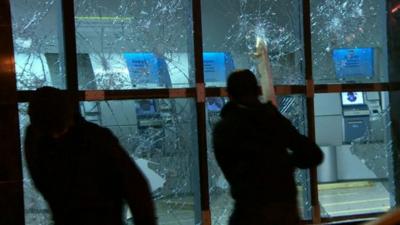 Protesters attacking Bank of Brazil