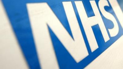 File photo dated 07/12/10 of a general view of an NHS logo.