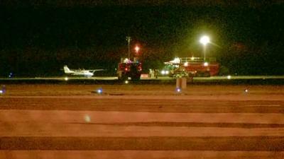 Emergency services and the aircraft on the runway at Humberside Airport