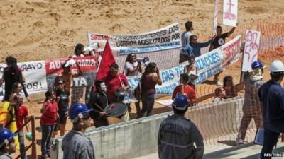 Protesters in Arena Pantanal stadium