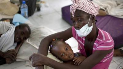 Sick victims receive treatment during cholera crisis in Haiti, October 2010