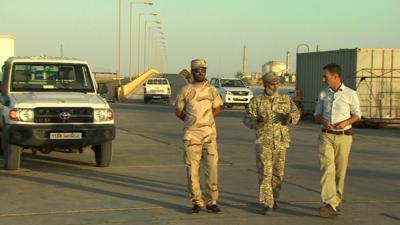 Libyan militiamen with Newsnight's Tim Whewell