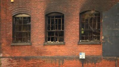 Windows of a building damaged by fire