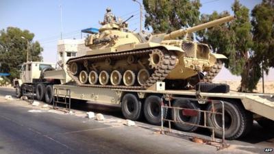 An Egyptian military tank is deployed in the northern Sinai town of Al-Arish (file photo)