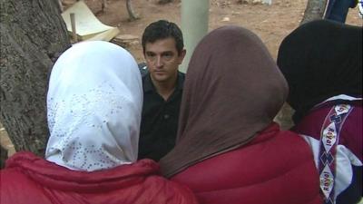 A refugee speaking to the BBC's Matthew Price in Lampedusa