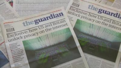 Copies of The Guardian newspaper.