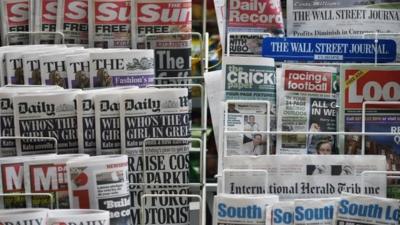 Newspapers on a stand