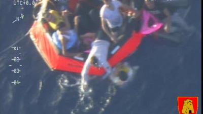 A life raft carrying survivors floats in the sea between Malta and Lampedusa