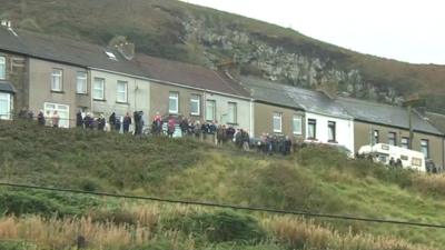 People line the street in Senghenydd