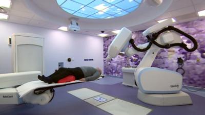 Someone being treated with CyberKnife