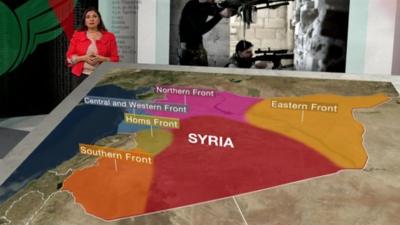 Lina Sinjab with a map of Syria