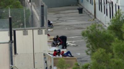 Migrants in a shelter