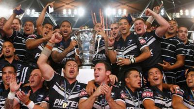 New Zealand celebrating with Rugby League trophy