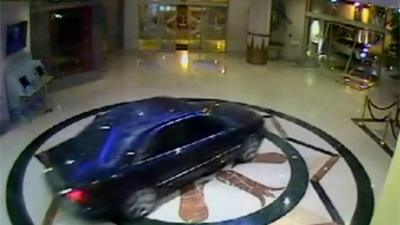 One of the gang's cars reverses into the Wafi City Mall in Dubai as the other enters