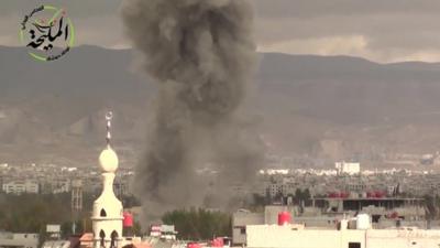 Smoke seen rising from buildings in Damascus