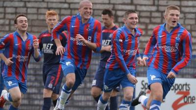 Ards players celebrate beating Portadown 3-1 at Clandeboye Park