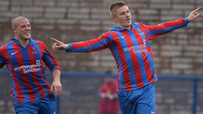 Andy Mitchell celebrates after putting Ards 1-0 ahead against Portadown