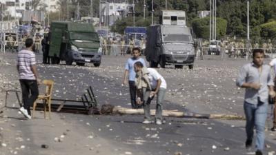 Protesters block a road