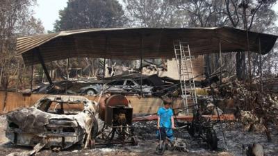 Charred remains of a a house in Winmalee