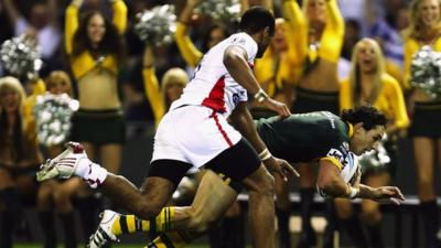 Billy Slater scoring a try for Australia