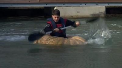 Dmitri Galitzine paddling in his pumpkin