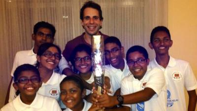 Mark Beaumont with a swimming team from the Maldives