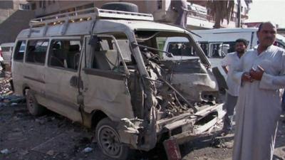 Destroyed front end of a minibus, Baghdad