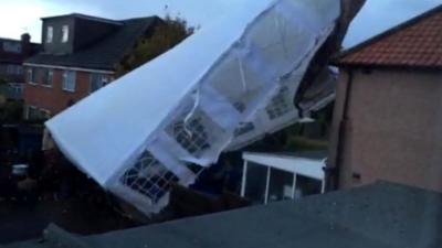 A marquee blown about by the storm in Harrow, Greater London