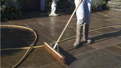 sweeping up after the storm