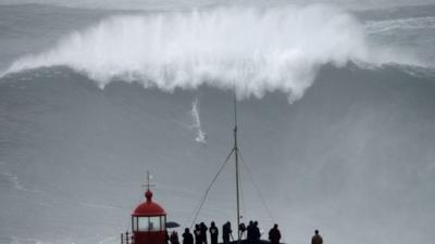 Carlos Burle rides a huge wave