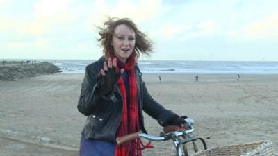 The BBC's Anna Holligan rides her bike