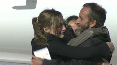 One of the hostages arriving in France