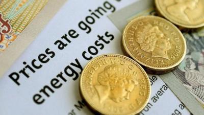 Pound coins on energy bill