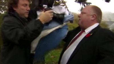 Toronto mayor Rob Ford in a skirmish with a cameraman