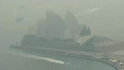 Sydney Opera House shrouded by smoke