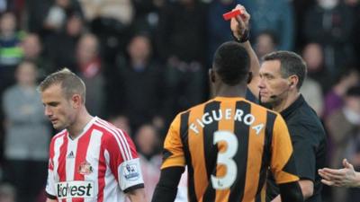 Lee Cattermole being sent off by referee Andre Marriner