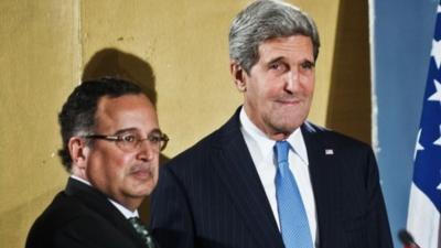 US Secretary of State John Kerry (R) shakes hands with Egyptian Foreign Affairs Minister Nabil Fahmy