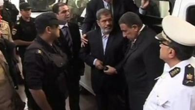 Mohammed Morsi arrives at court