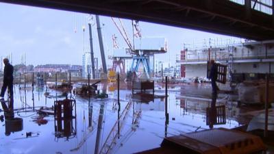 Workers at a shipyard on the Clyde