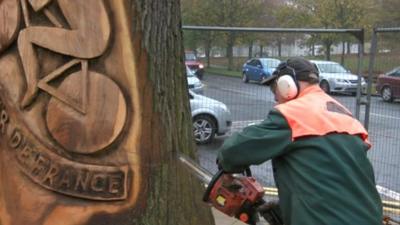 Tree being carved