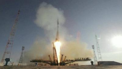 Soyuz rocket launches Olympic torch into space