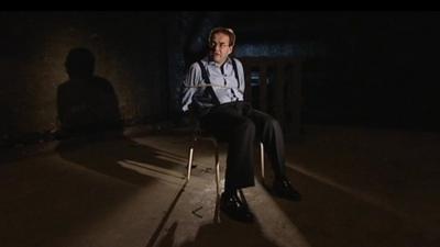 Quentin Letts tied to a chair