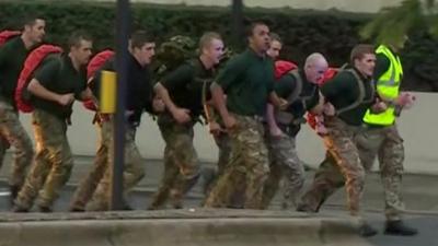 Serviceman running