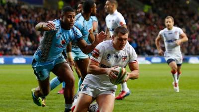 Brett Ferres scoring a try