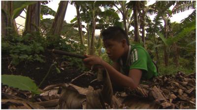 Boy with a pretend gun