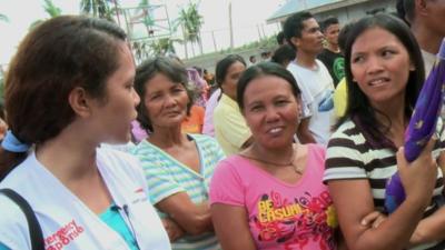 Aid worker with victims